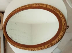 Miroir ovale ancien glace biseauté en bois et stuc XIXeme