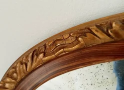 Miroir ovale ancien glace biseauté en bois et stuc XIXeme