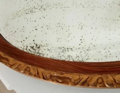 Miroir ovale ancien glace biseauté en bois et stuc XIXeme
