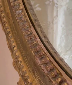 Miroir ovale ancien à la feuille d'or – Fronton nœud & motifs floraux style