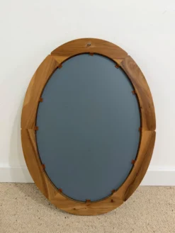 Miroir ovale années 70 en orme massif