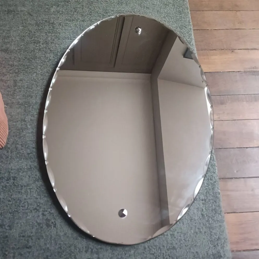Miroir ovale biseauté Art Déco