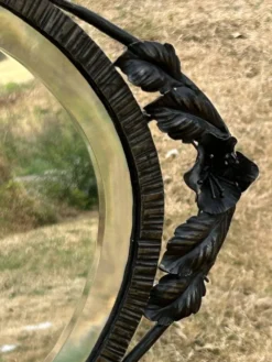 Miroir ovale biseauté art déco fer forgé richement travaillé