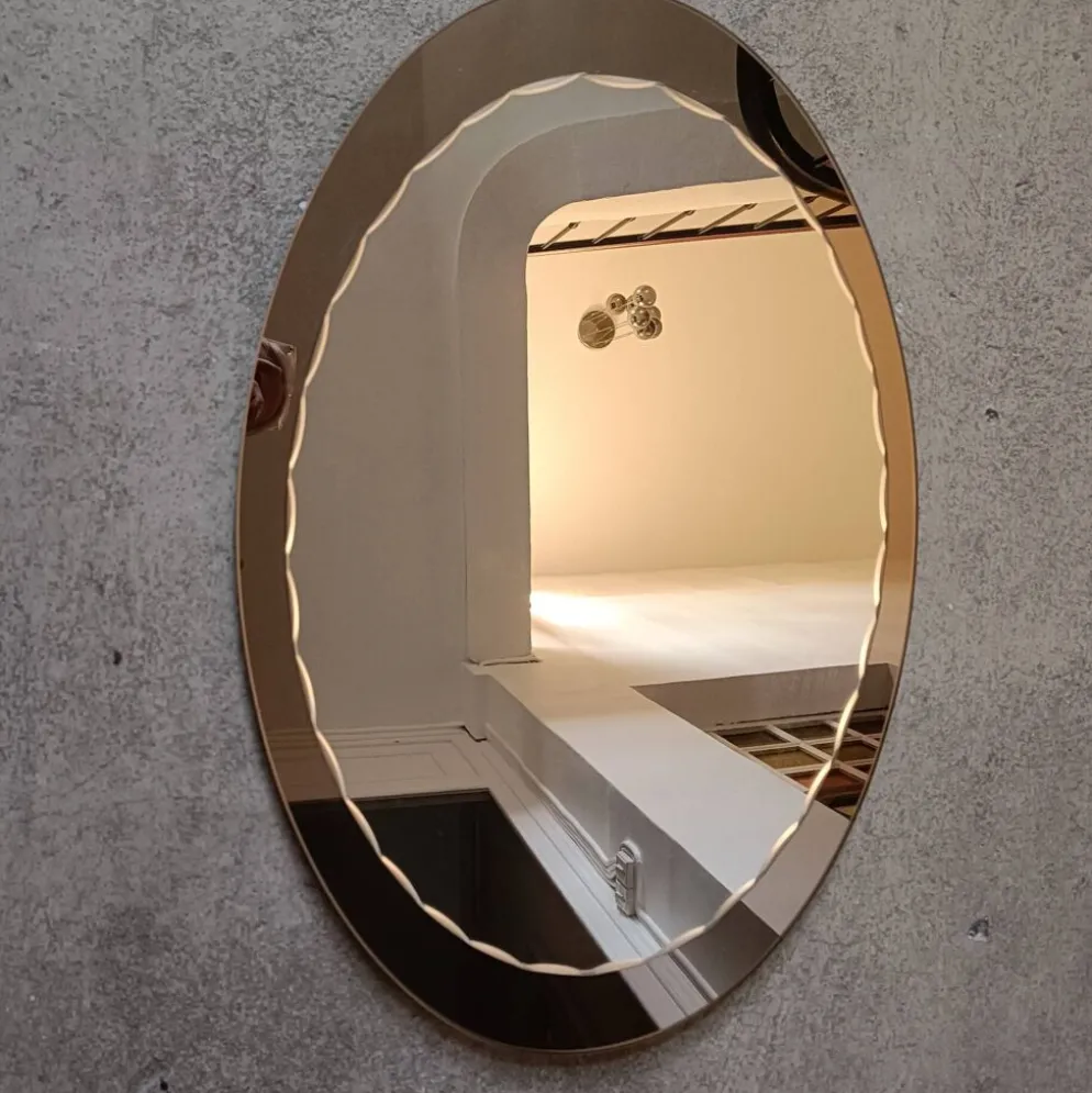 Miroir ovale biseauté seventies