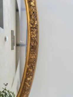 Miroir ovale en bois doré, style Louis XVI