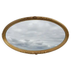 Miroir ovale en bois doré, style Louis XVI
