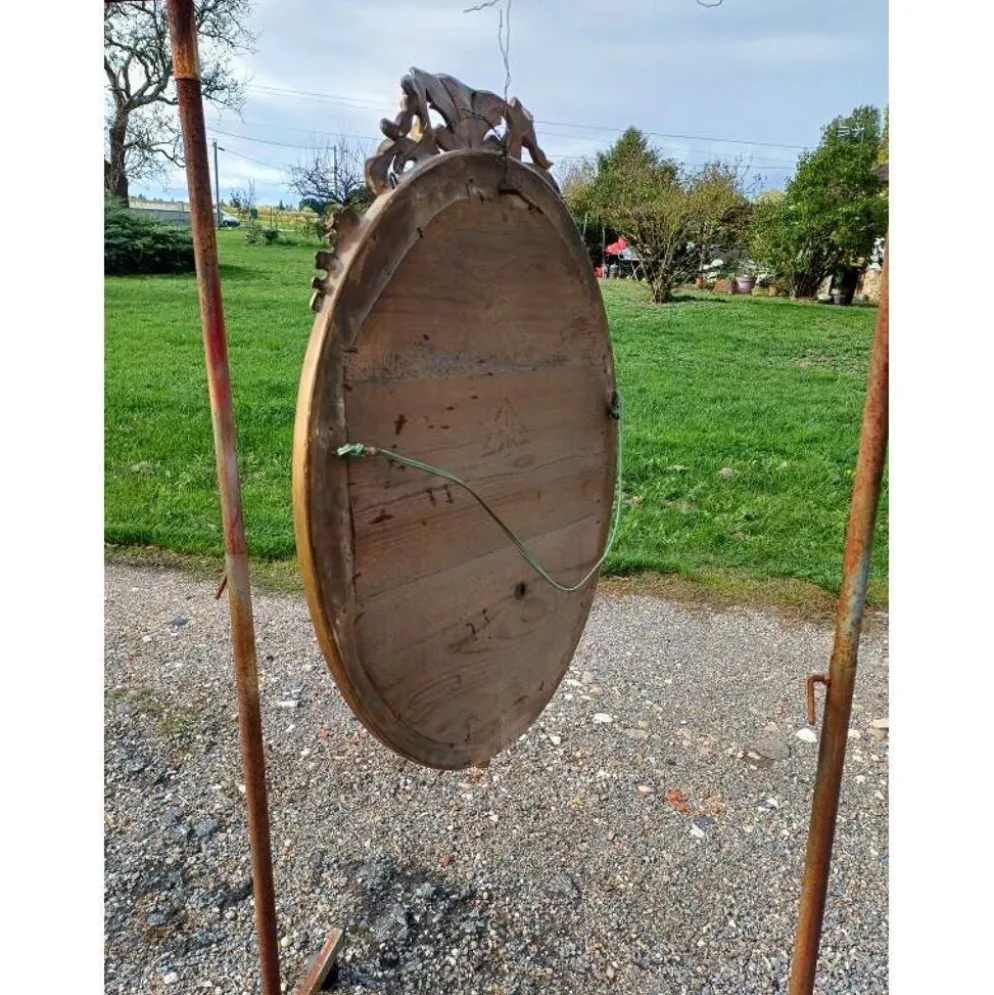 Miroir ovale en bois et stuc doré 19ème
