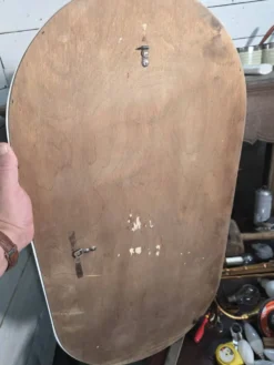 Miroir ovale en laqué blanc des années 70
