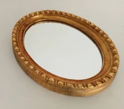 Miroir ovale italien vintage en bois doré
