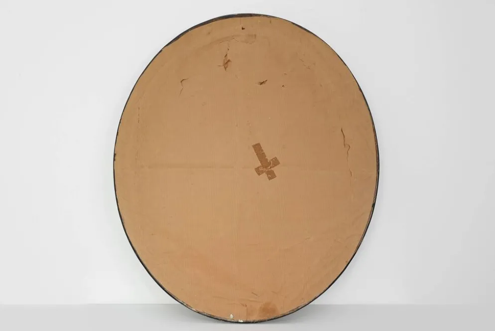 Miroir ovale néoclassique français en noir et or, 20e siècle
