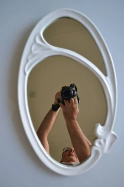 Miroir ovale style art nouveau Jugendstil en fonte de fer émaillée 49 x 29