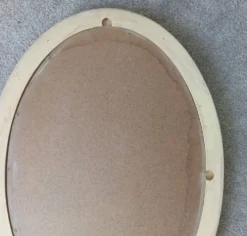 Miroir ovale vintage en bois patiné
