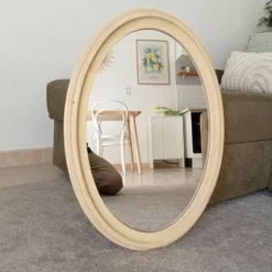 Miroir ovale vintage en bois patiné