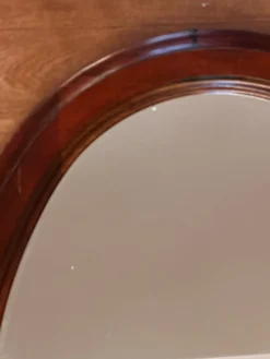 Miroir ovale vintage en bois teinté – 66 × 48,5 cm