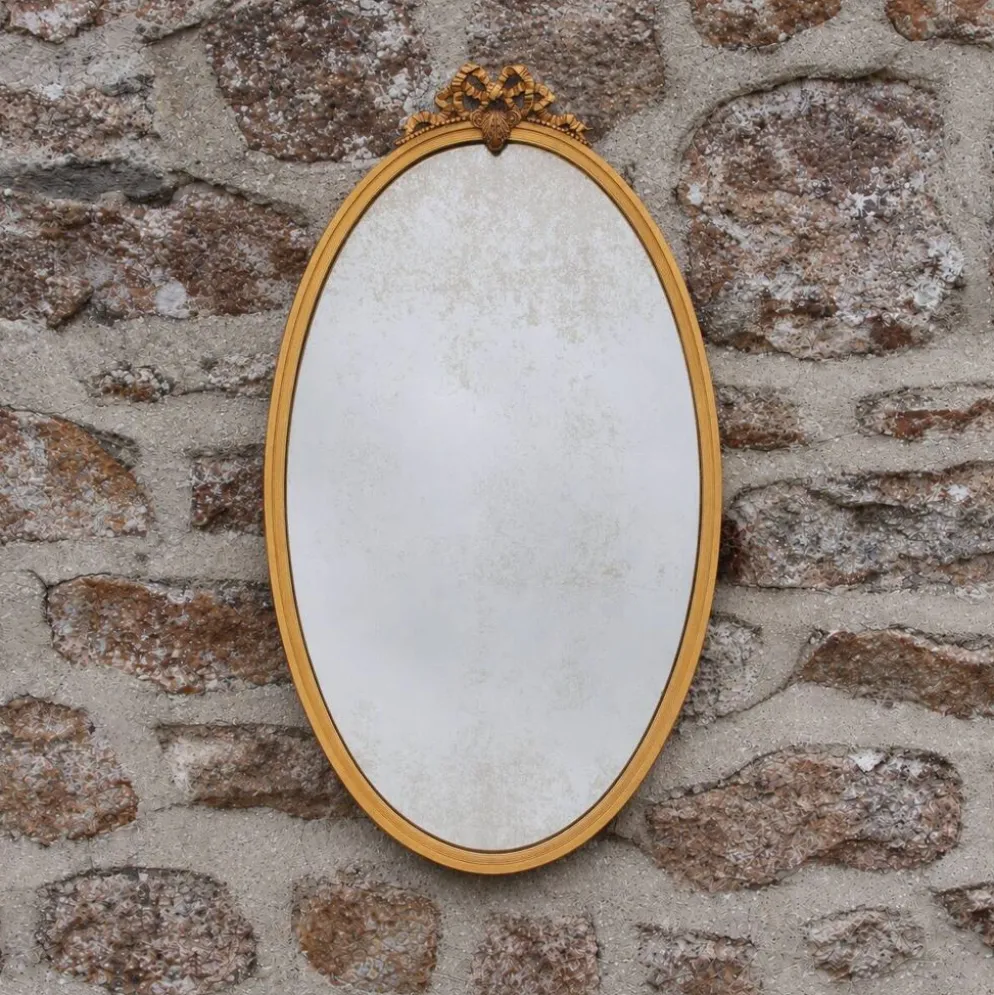 Miroir ovale vintage en métal doré à nœud – style Louis XVI / romantique