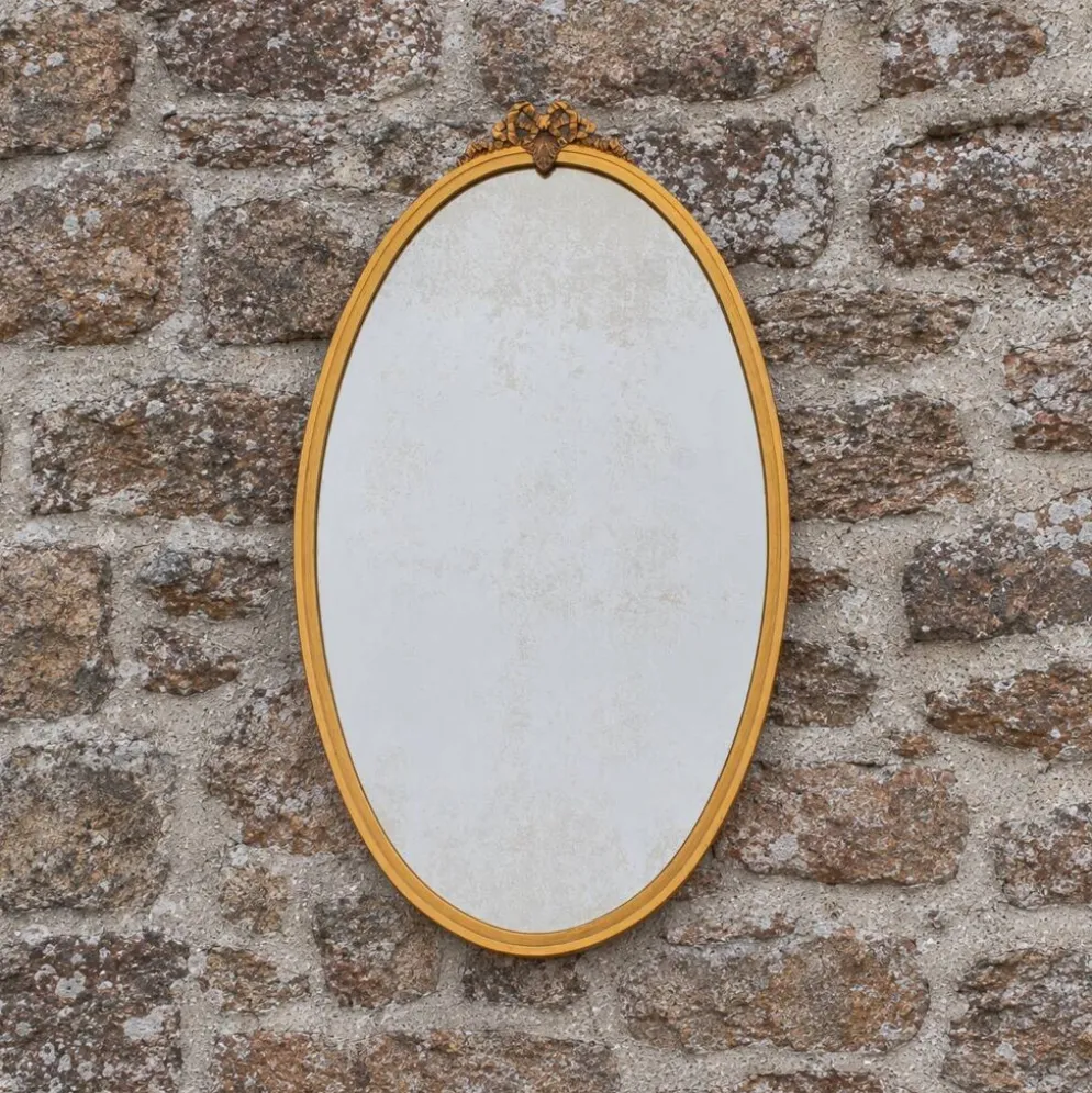 Miroir ovale vintage en métal doré à nœud – style Louis XVI / romantique