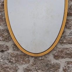 Miroir ovale vintage en métal doré à nœud – style Louis XVI / romantique