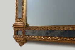 Miroir rococo-vénitien belge du XXe siècle en bois doré