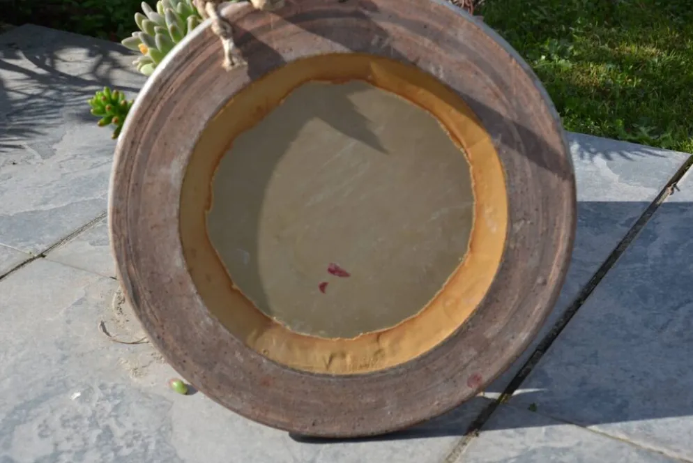 Miroir rond en céramique signé