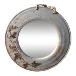 Miroir rond en céramique signé