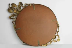 Miroir rond néoclassique français en finition cuivre, 20e siècle