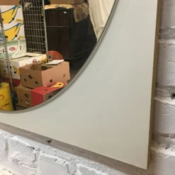 Miroir rond sur support stratifié