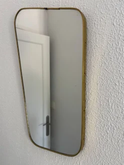 Miroir rétroviseur asymétrique, 1960