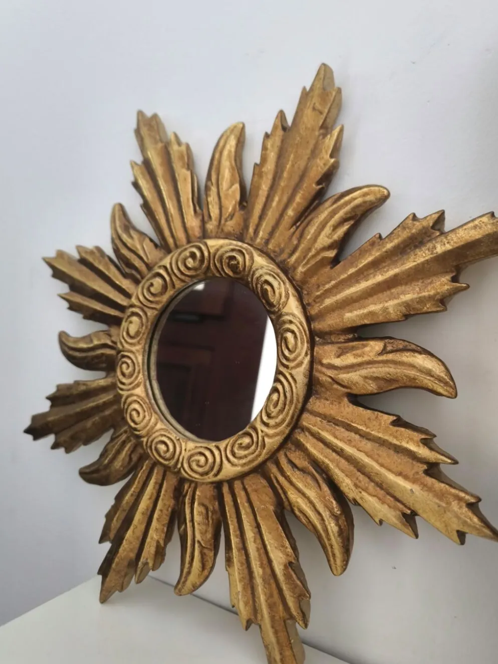 Miroir soleil doré