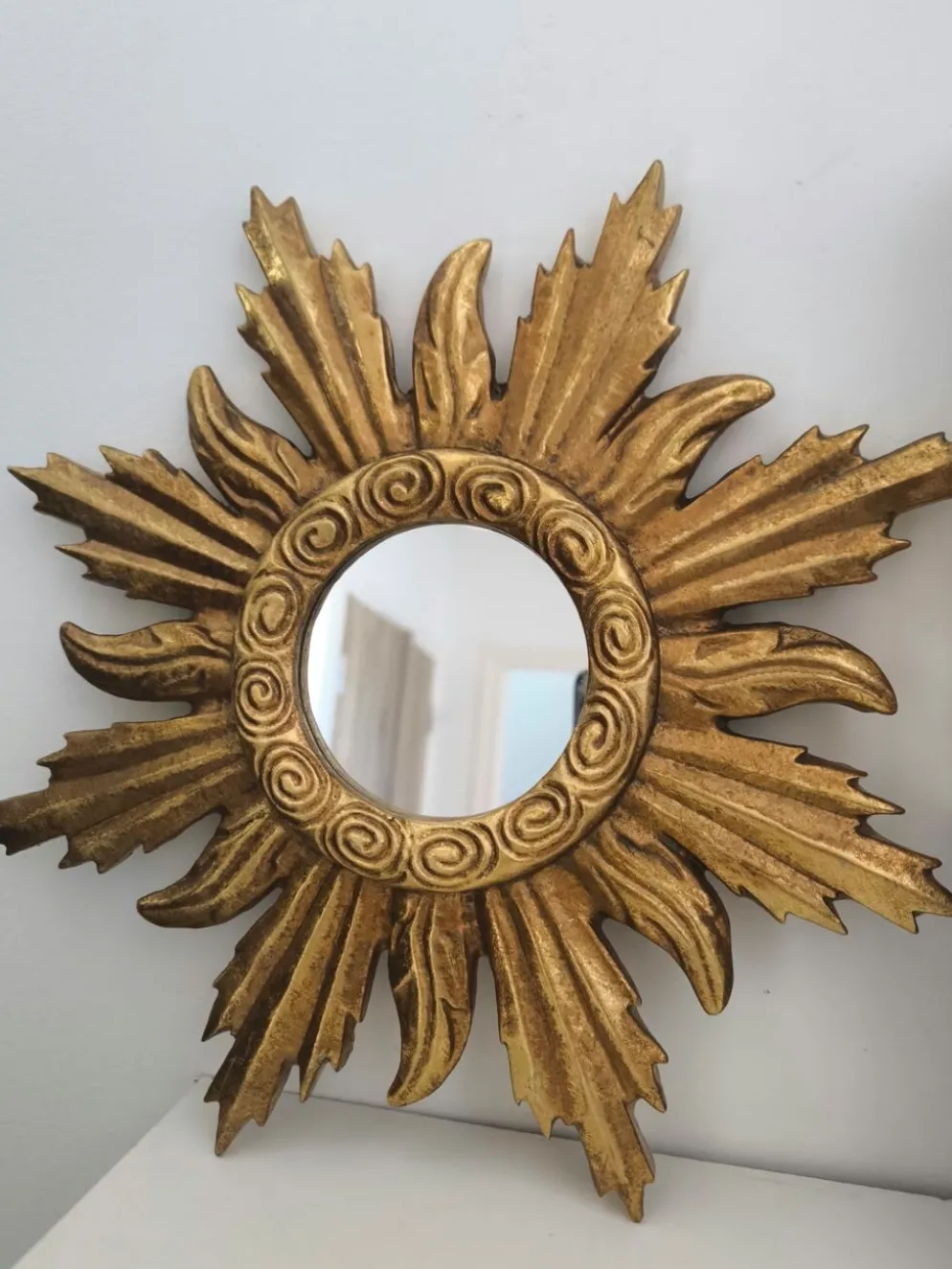 Miroir soleil doré