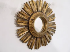Miroir soleil en bois doré 1950