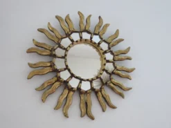 Miroir soleil en bois doré avec incrustations début XXème