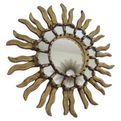 Miroir soleil en bois doré avec incrustations début XXème