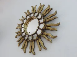 Miroir soleil en bois doré avec incrustations début XXème
