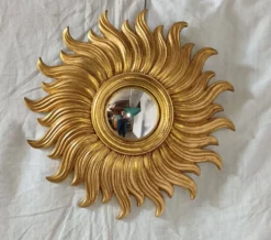Miroir soleil en bois doré des années 90