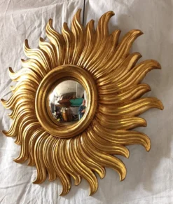 Miroir soleil en bois doré des années 90