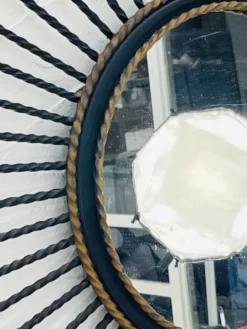 Miroir soleil vintage en métal noir et doré années 60