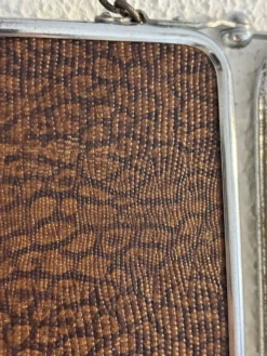 Miroir triptyque de barbier chromé, biseauté et simili imitant le serpent, 1940