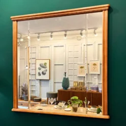 Miroir vintage avec cadre en bois sculpté