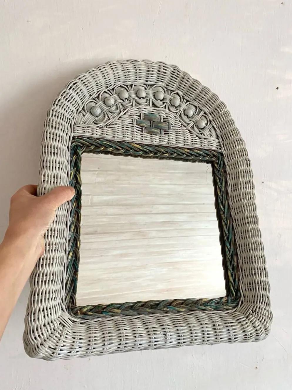 Miroir vintage en rotin tressé