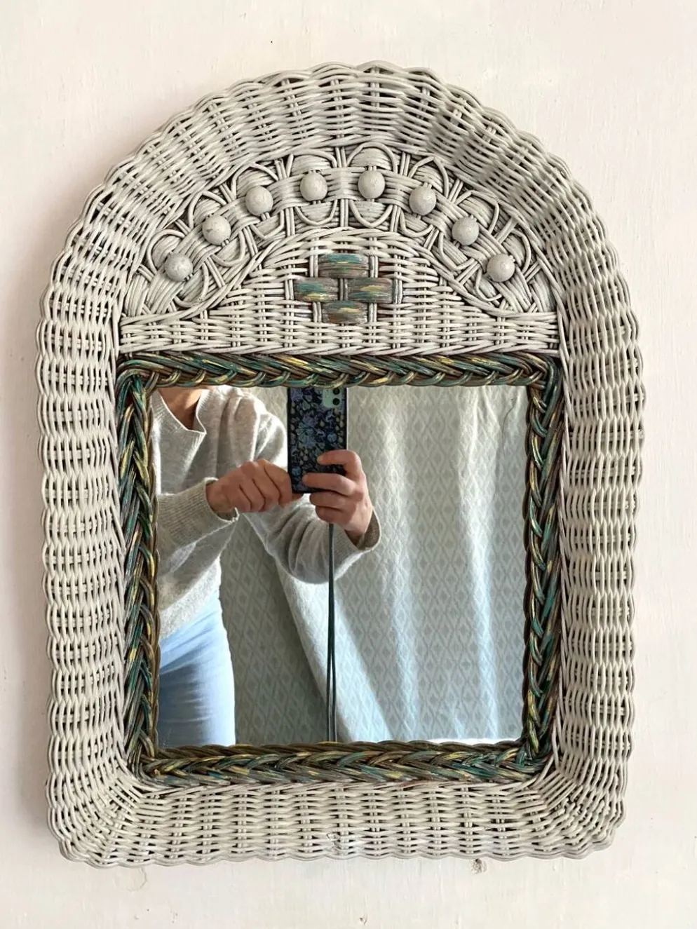 Miroir vintage en rotin tressé