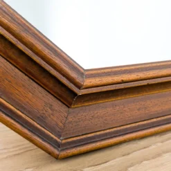 Miroir vintage octogonal en bois massif avec détails sculptés