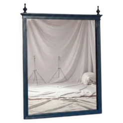 Miroir vintage restauré en bleu marine, style Louis XVI.