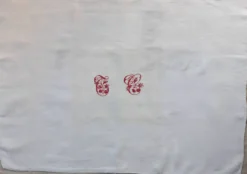 Nappe avec monogramme TC central