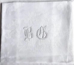 Nappe d'appoint damassée monogrammée