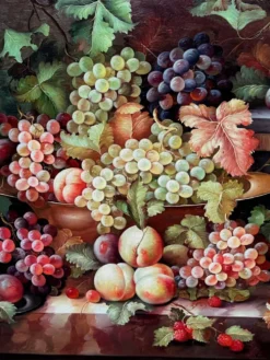 Nature morte avec fruits. Huile sur toile. Signé.