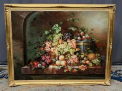 Nature morte avec fruits. Huile sur toile. Signé.