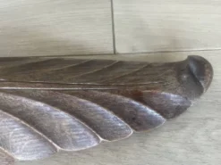 4 objets décoratifs en bois sculpté