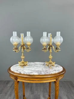 Paire de candélabres à trois lumières en bronze, XXe siècle