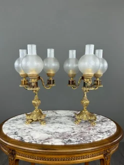 Paire de candélabres à trois lumières en bronze, XXe siècle