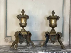 Paire de chenets de style Louis XIV en bronze d’après un dessin de André-Charles Boulle